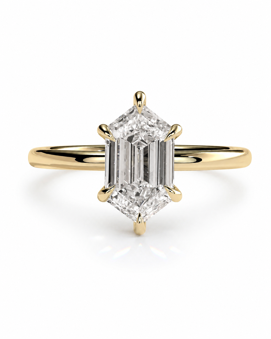 color_10K_YG, color_14K_YG &&A yellow gold ring featuring a large emerald-cut diamond solitaire in a six-prong setting, shown on a clean white background with a soft reflection.