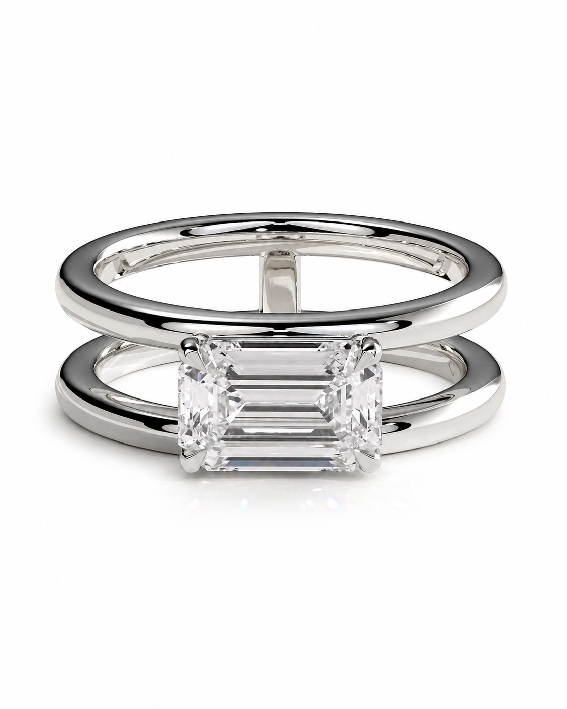 color_925_SIL,color_935_ARG,color_10K_WG, color_14K_WG &&A polished silver-tone double-band ring with a large rectangular emerald-cut clear gemstone, shown on a clean white background.