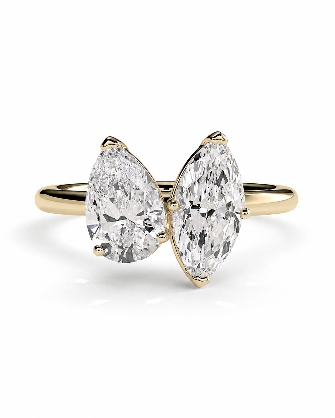 color_10K_YG, color_14K_YG &&A double pear-cut diamond ring in yellow gold, featuring two marquise-shaped diamonds set in a split band, shown on a clean white background.