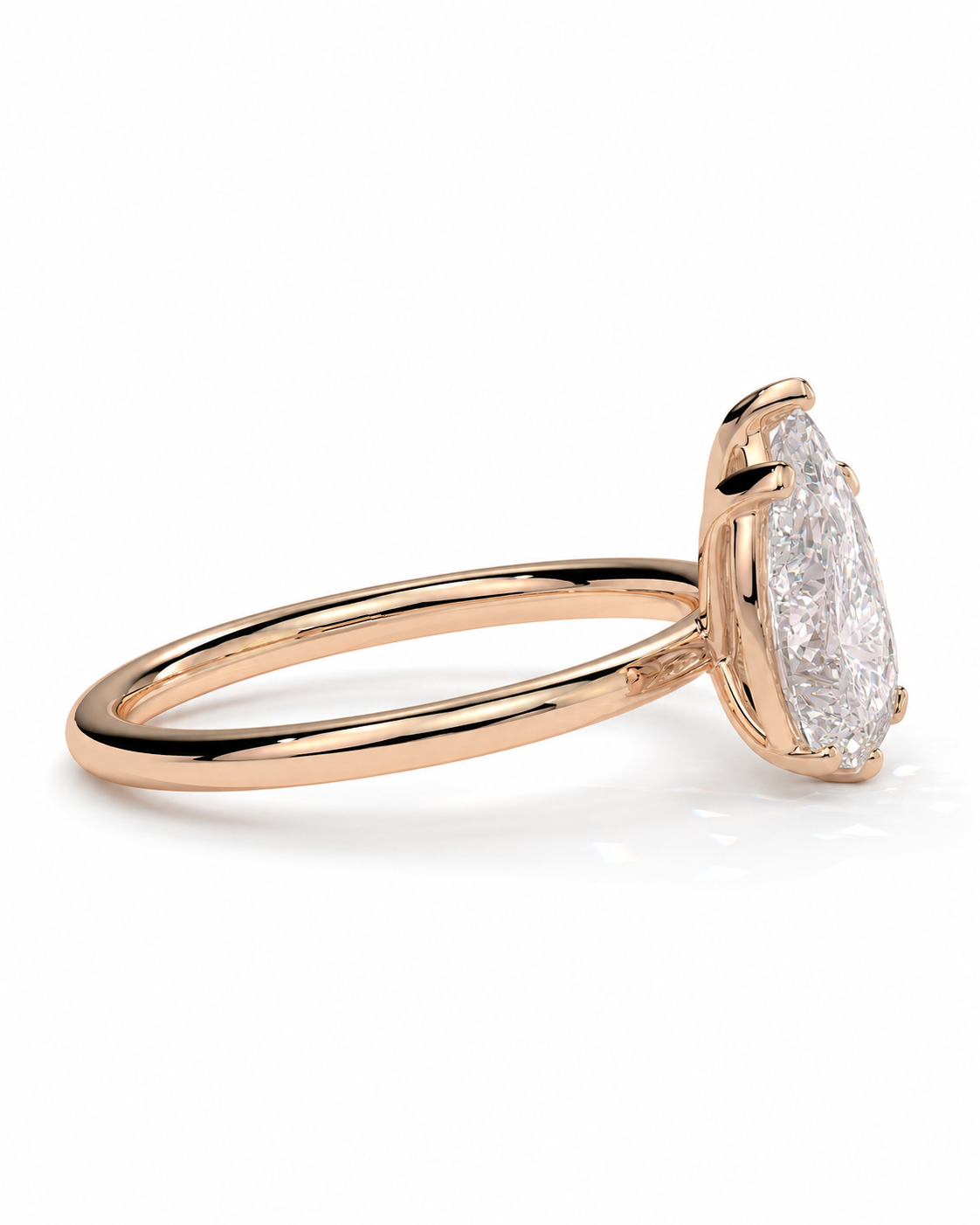 color_10K_RG, color_14K_RG &&A rose gold ring featuring a large, bezel-set marquise-cut diamond. The diamond is clear and does not contribute to the color mapping according to the schema rules, so the product color is identified solely by its metal setting, which is rose gold.