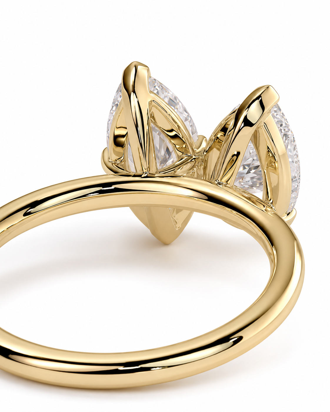 color_10K_YG, color_14K_YG &&A close-up shot of a yellow gold butterfly ring with clear gemstones on a white background.