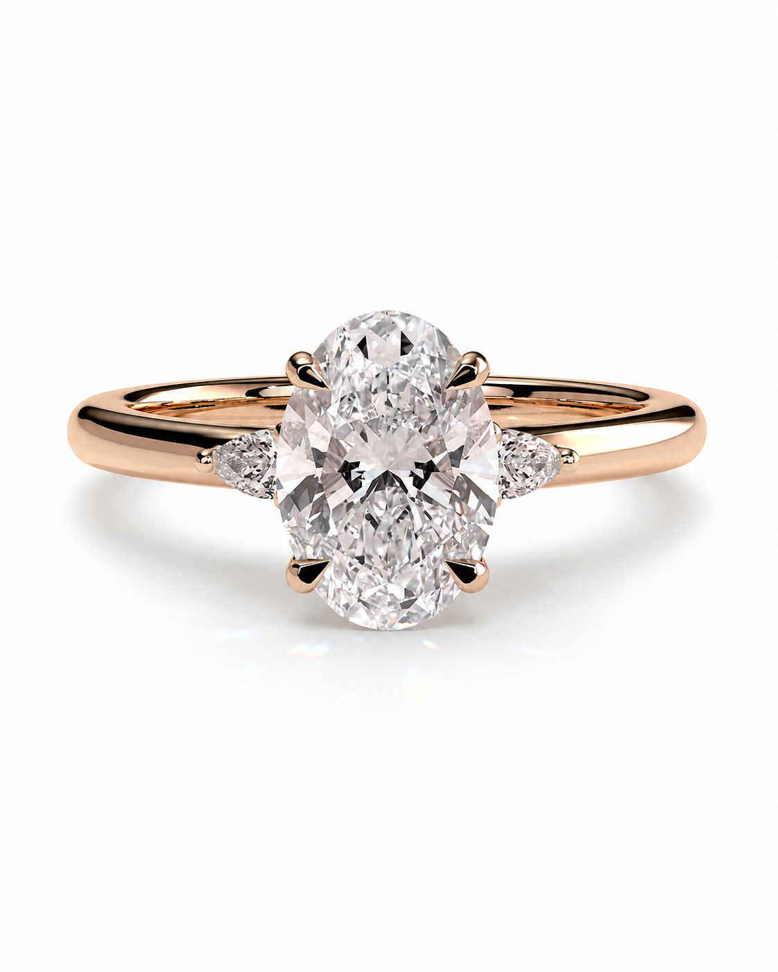 color_10K_RG, color_14K_RG &&An oval diamond engagement ring with a rose gold band, featuring a large center diamond and smaller side diamonds, set against a clean white background.