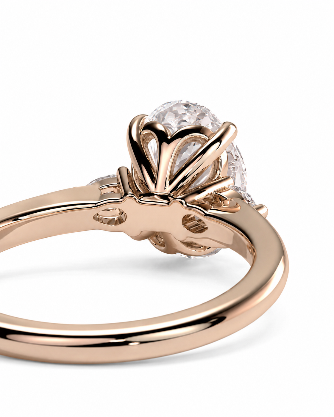 color_10K_RG, color_14K_RG &&A close-up of a rose gold ring with a large clear round-cut gemstone in a crown-like setting, shown on a clean white background.