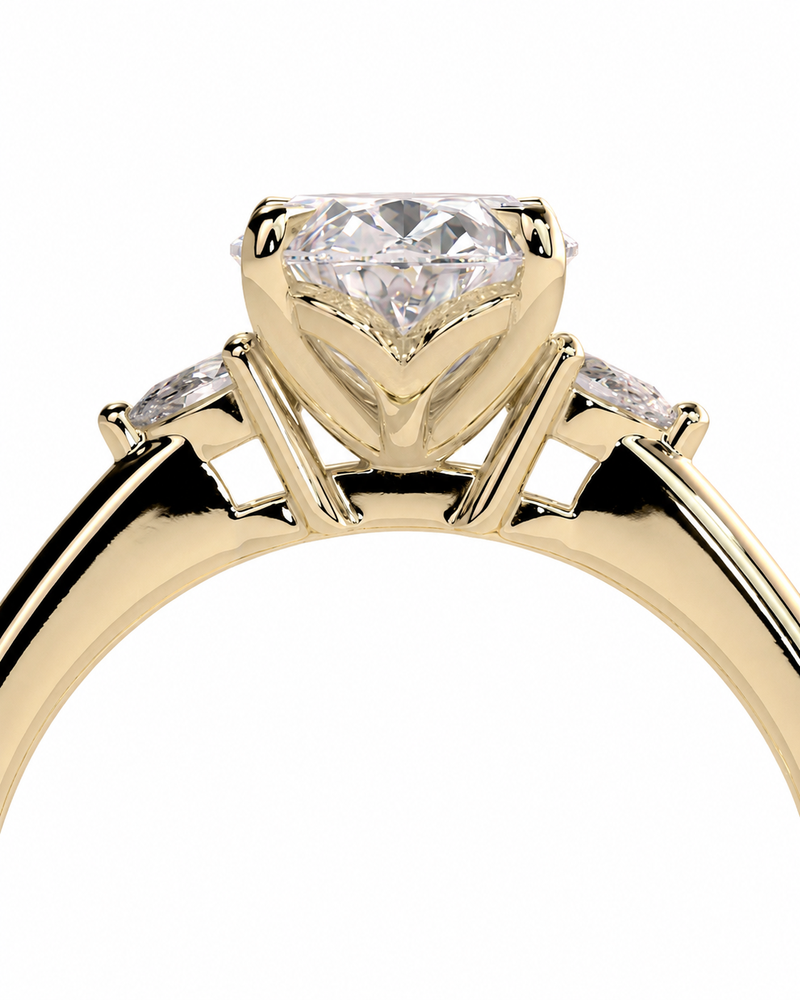 color_10K_YG, color_14K_YG &&A close-up of a yellow gold solitaire engagement ring with a large round-cut center stone and small side stones, shown on a plain white background.