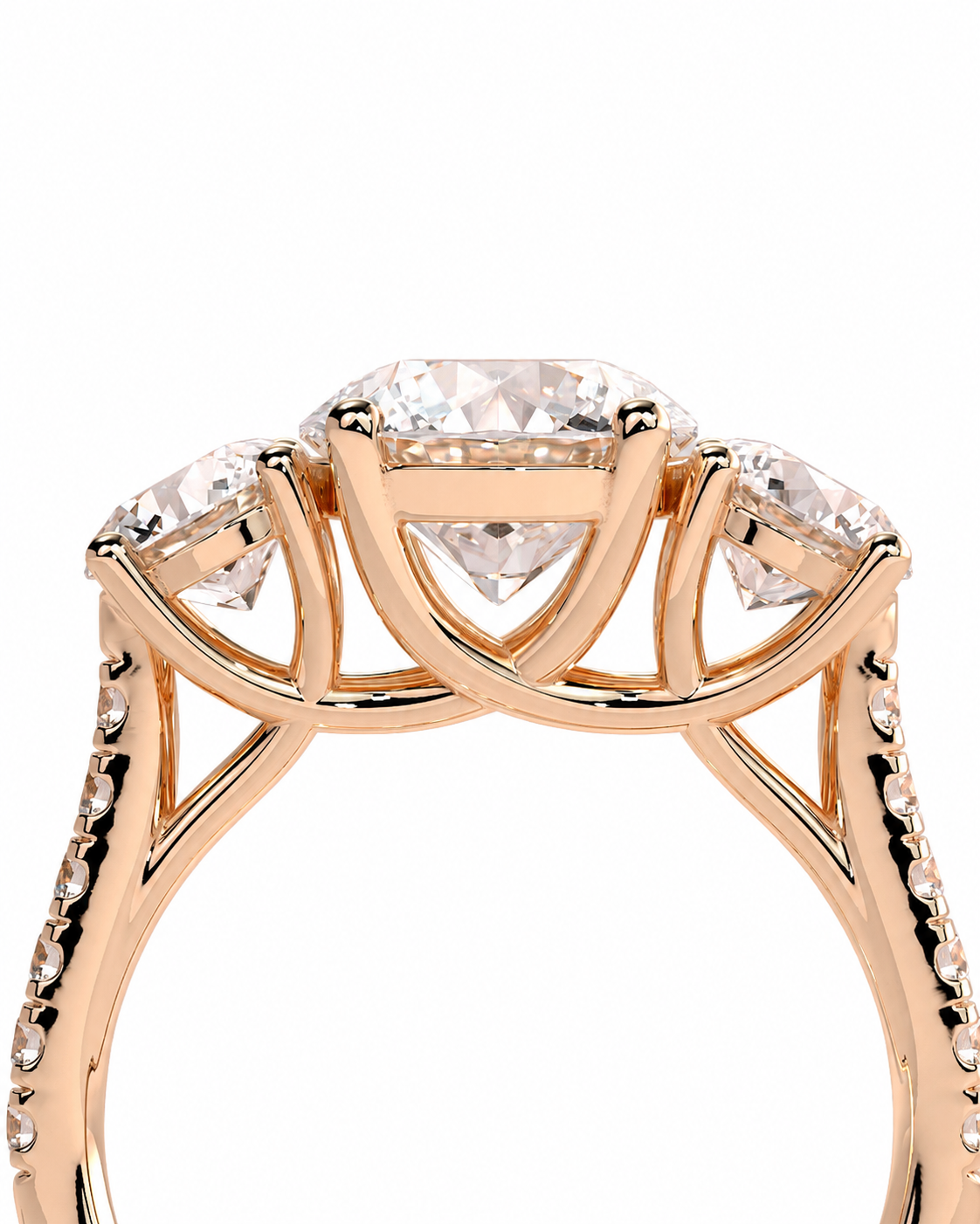 color_10K_RG, color_14K_RG &&Rose gold three-stone diamond ring with a large oval center stone and smaller round side stones, shown on a white background.