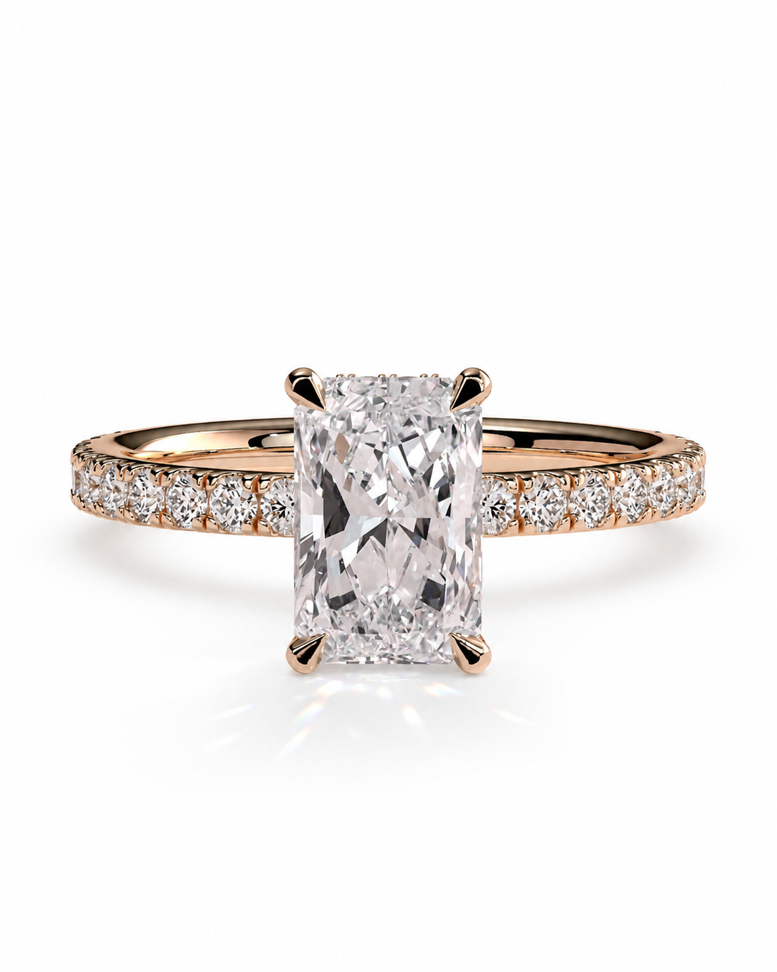 color_10K_RG, color_14K_RG &&A rose gold engagement ring featuring a large rectangular radiant-cut center stone in a four-prong setting, with a shank paved with small round stones, shown on a clean white background.