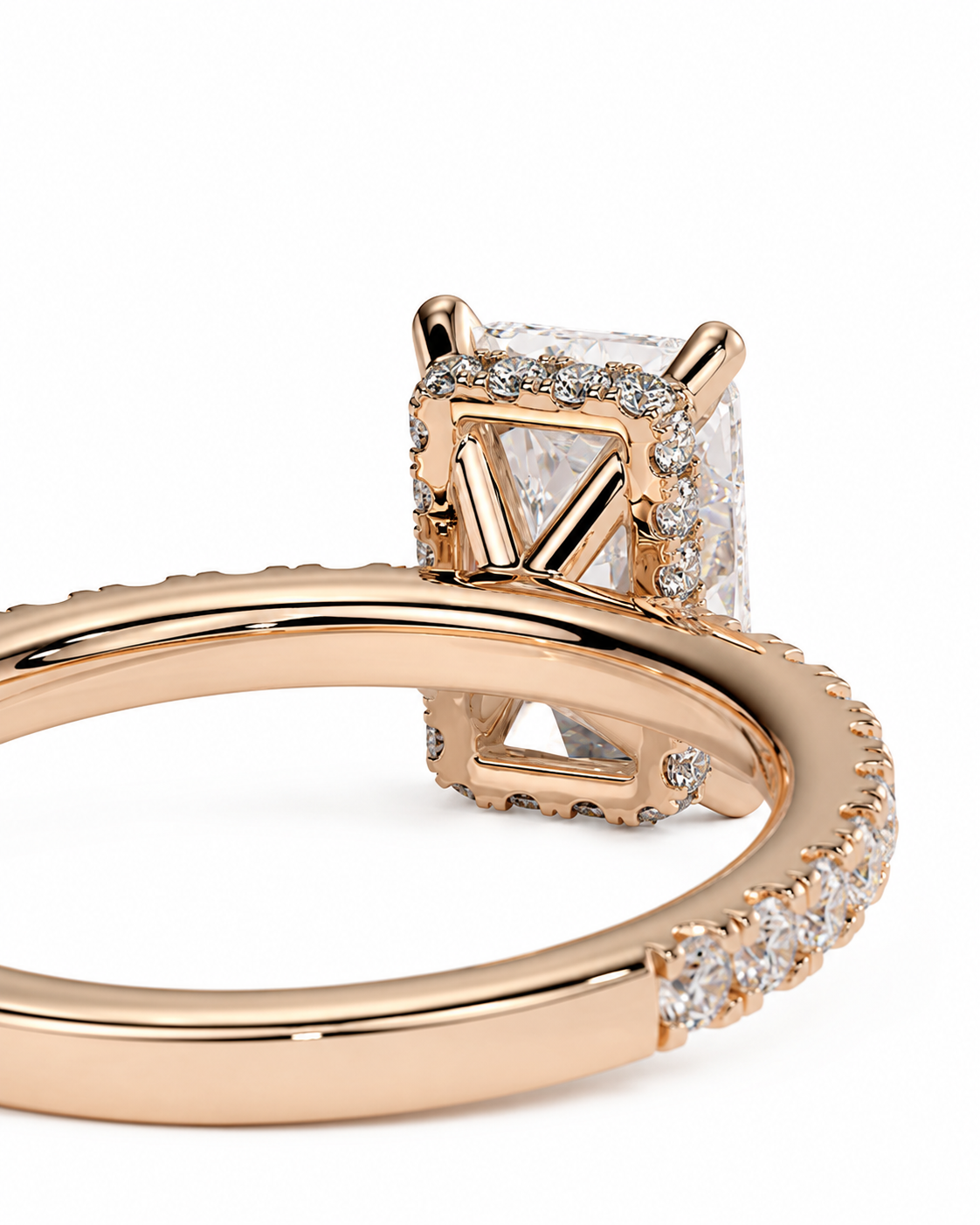 color_10K_RG, color_14K_RG &&Rose gold ring with a square clear gemstone in a prong setting, accented with small pave diamonds along the band, shown on a white background.