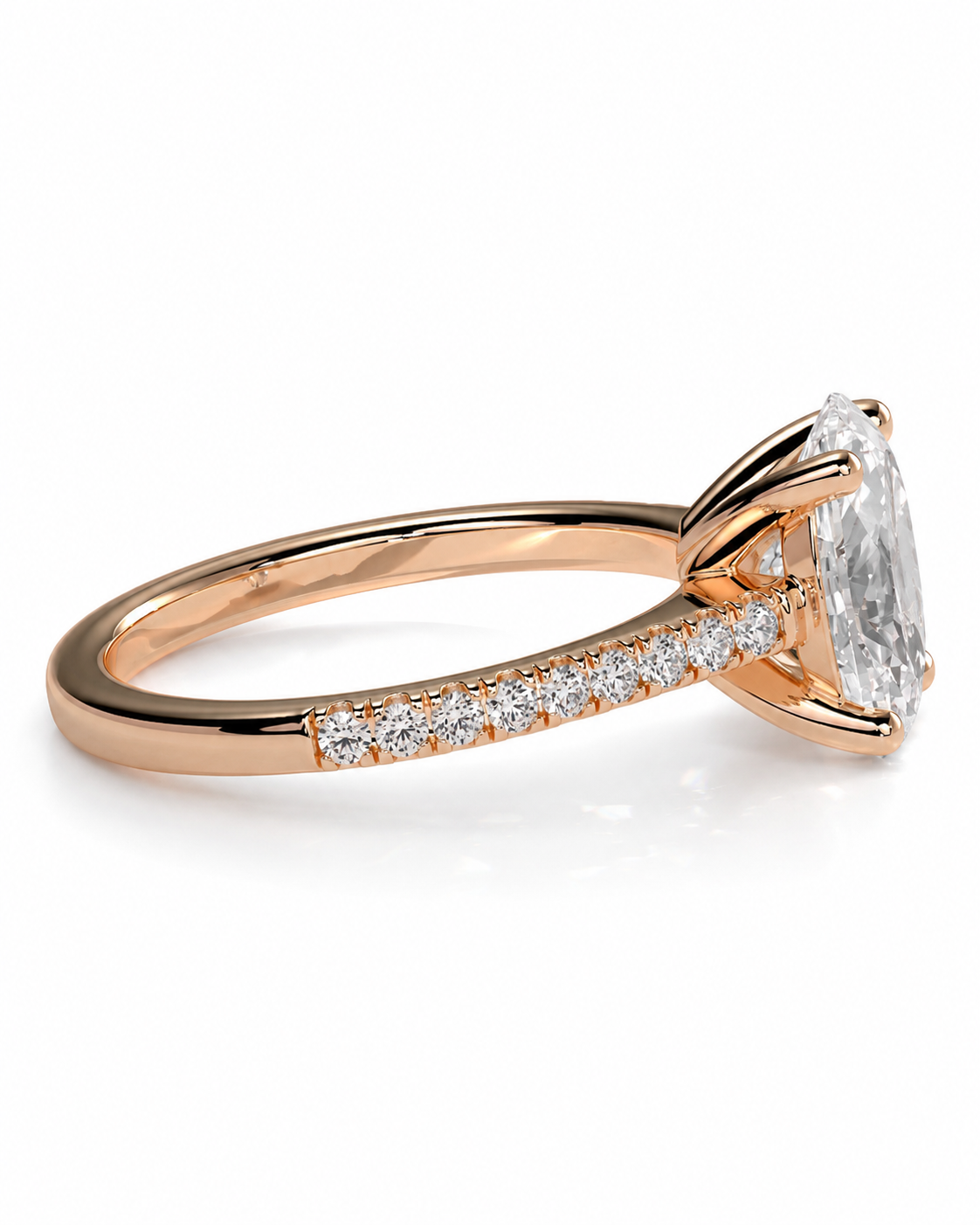 color_10K_RG, color_14K_RG &&Rose gold engagement ring with a marquise-cut clear center stone and a pave band of small round diamonds, shown on a white background.