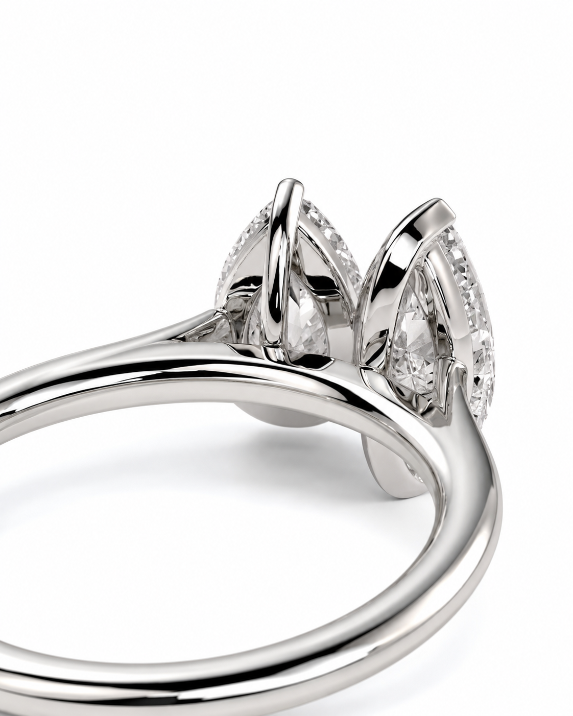 color_925_SIL,color_935_ARG,color_10K_WG, color_14K_WG &&A close-up studio shot of a silver-toned ring featuring marquise-cut center stones and small pavé-set accent stones on a clean white background.
