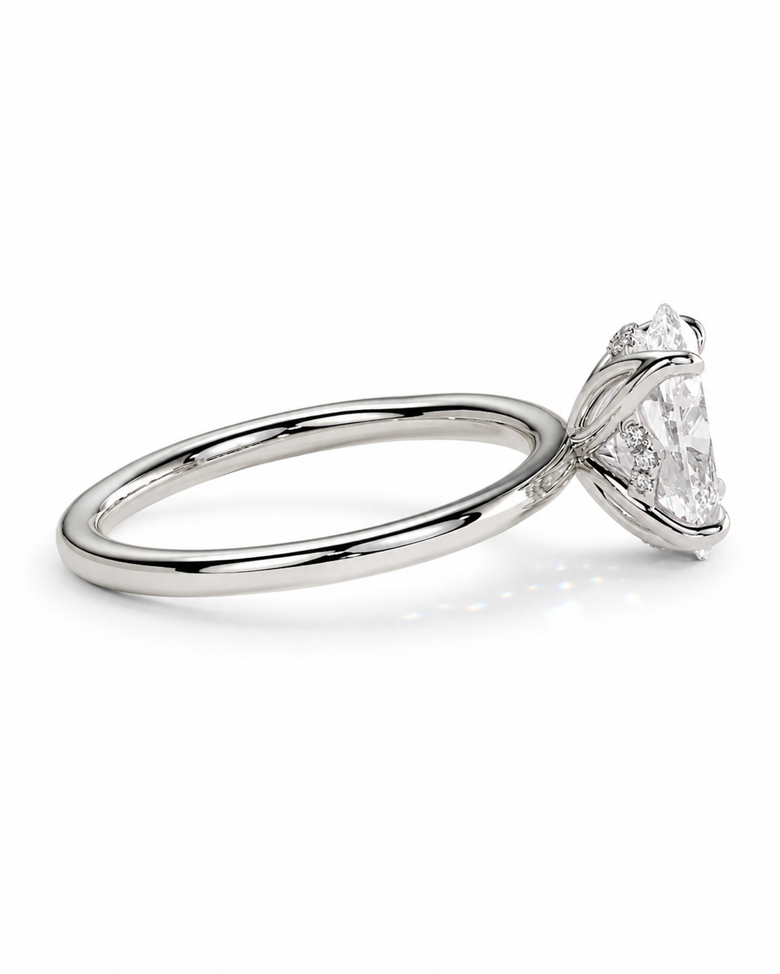 color_925_SIL,color_935_ARG,color_10K_WG, color_14K_WG &&A silver engagement ring featuring a large triangular-cut diamond center stone in a prong setting, with smaller diamonds along the band, shown on a clean white background.