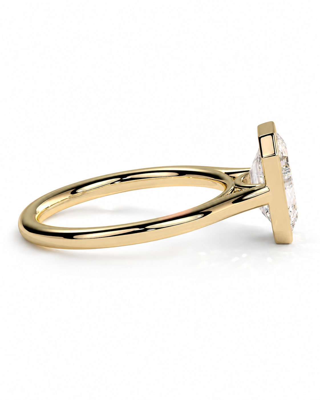 color_10K_YG, color_14K_YG &&A yellow gold ring with a square bezel setting holding a clear gemstone, shown in a side profile view against a white background.