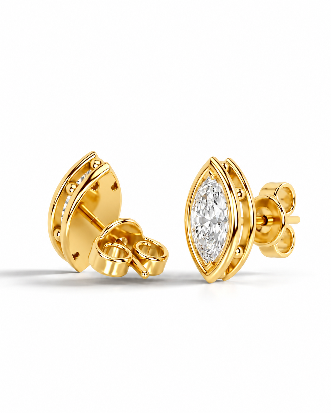 color_10K_YG, color_14K_YG &&A pair of gold stud earrings with marquise-cut clear gemstones, shown on a clean white background. One earring is oriented to show the front view of the marquise stone, while the other is turned to show the side profile and butterfly clutch backing.
