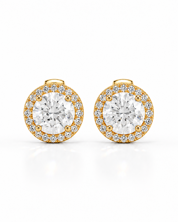 color_10K_YG, color_14K_YG &&A pair of round gold stud earrings with a central clear gemstone surrounded by a halo of smaller clear stones, shown on a clean white background.