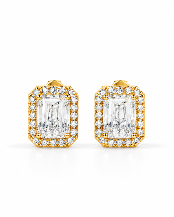 color_10K_YG, color_14K_YG &&A pair of yellow gold stud earrings featuring large emerald-cut clear gemstones surrounded by a halo of smaller round-cut stones, set against a clean white background.