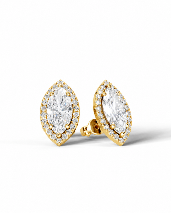 color_10K_YG, color_14K_YG &&A pair of gold marquis stud earrings featuring marquise-cut clear gemstones surrounded by a halo of smaller diamonds, shown on a clean white background.