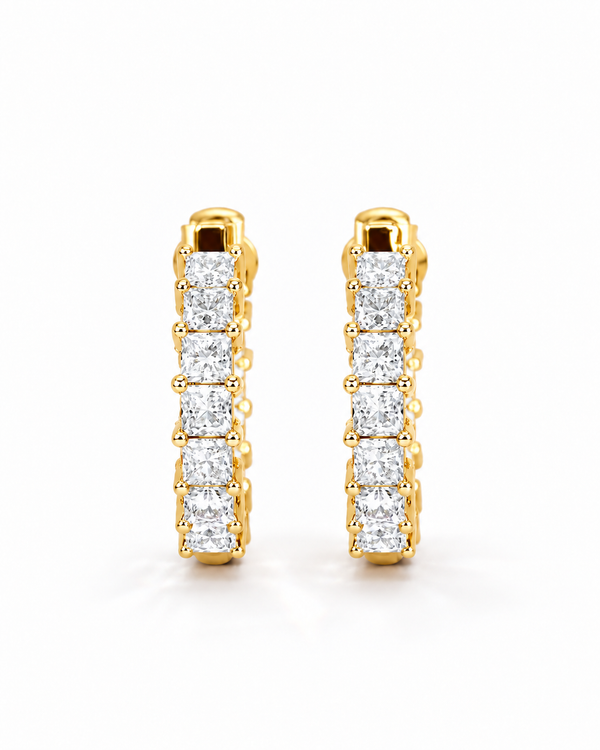color_10K_YG, color_14K_YG &&A pair of gold huggie hoop earrings set with a row of princess-cut diamonds, shown against a clean white background.