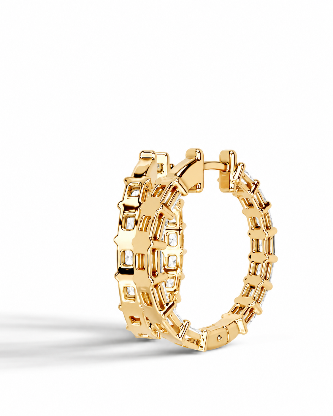 color_10K_YG, color_14K_YG &&A pair of gold hoop earrings with a textured, geometric link design and small clear stones, shown on a clean white background.