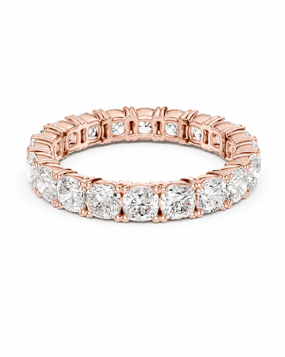color_10K_RG, color_14K_RG &&A rose gold eternity ring featuring a continuous line of round brilliant-cut diamonds in a prong setting, shown against a plain white background.
