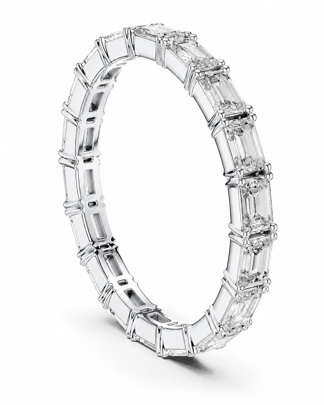 color_925_SIL,color_935_ARG,color_10K_WG, color_14K_WG &&A silver-toned eternity ring featuring a continuous row of baguette-cut clear gemstones, shown on a clean white background.