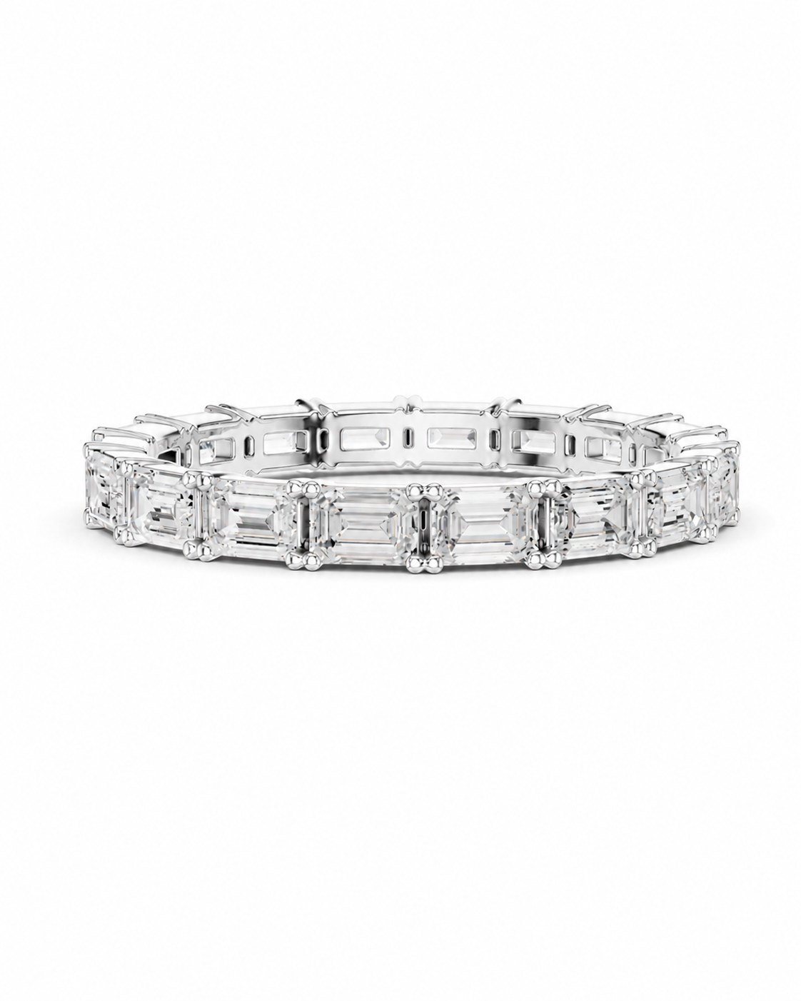 color_925_SIL,color_935_ARG,color_10K_WG, color_14K_WG &&A silver tennis bracelet featuring baguette-cut clear gemstones, displayed against a solid white background.