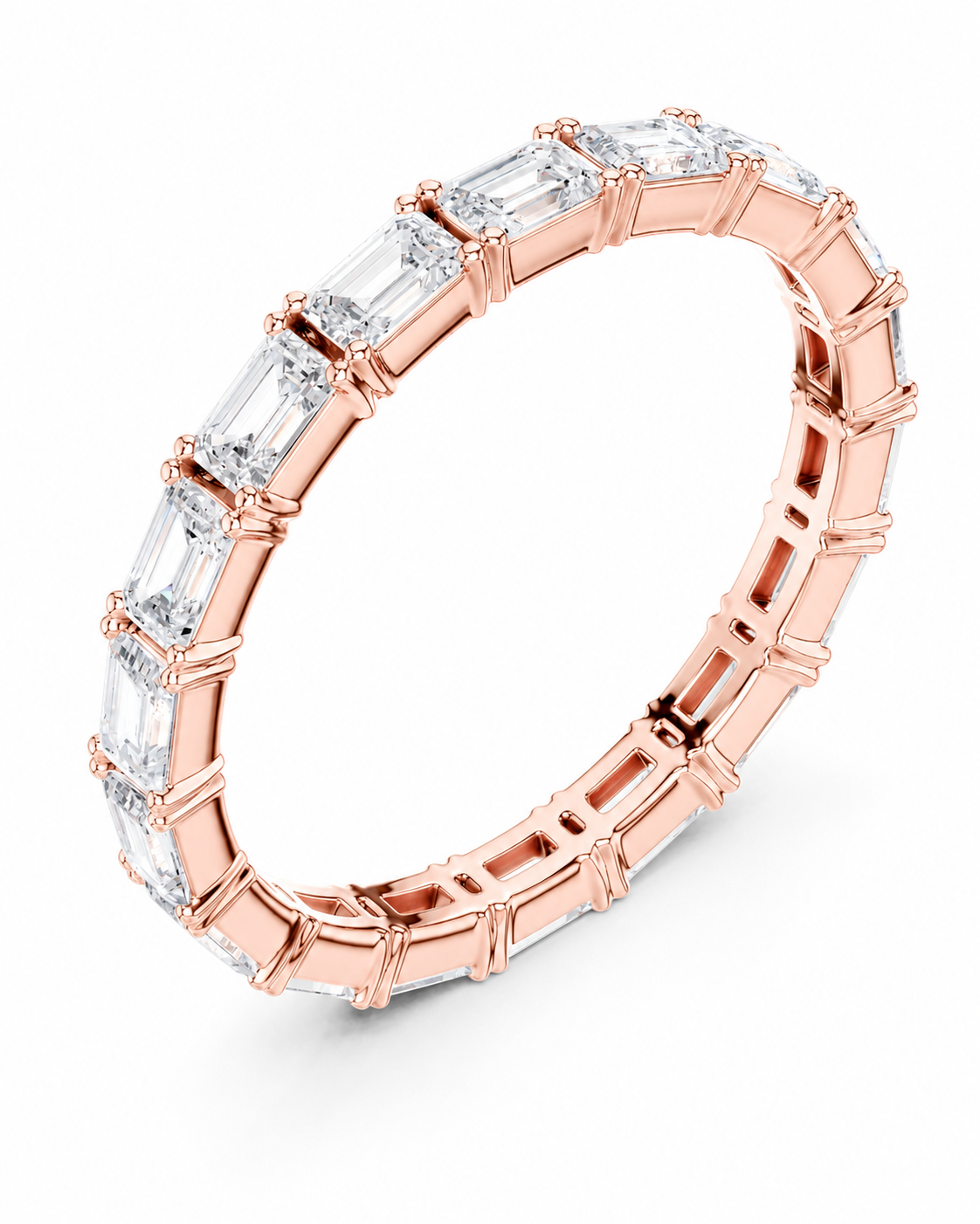 color_10K_RG, color_14K_RG &&A rose gold eternity ring featuring a continuous row of baguette-cut clear gemstones in a prong setting, shown on a clean white background.