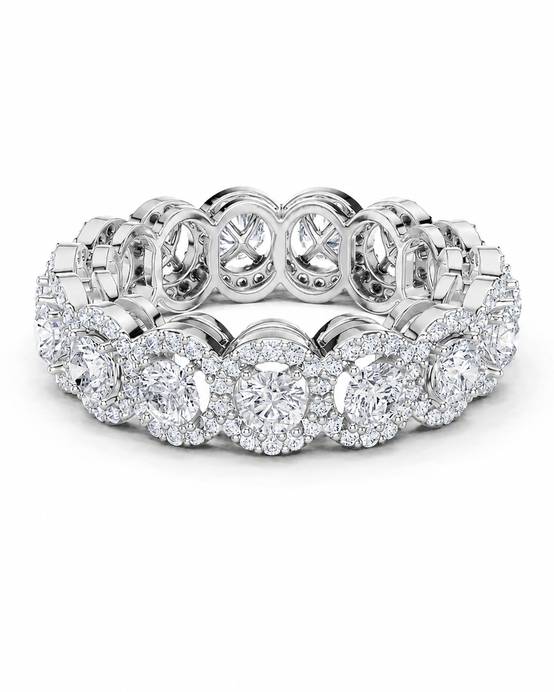 color_925_SIL,color_935_ARG,color_10K_WG, color_14K_WG &&A diamond eternity band ring in a silver-toned setting, featuring round brilliant-cut center diamonds surrounded by halo and pave diamonds, shown on a clean white background.