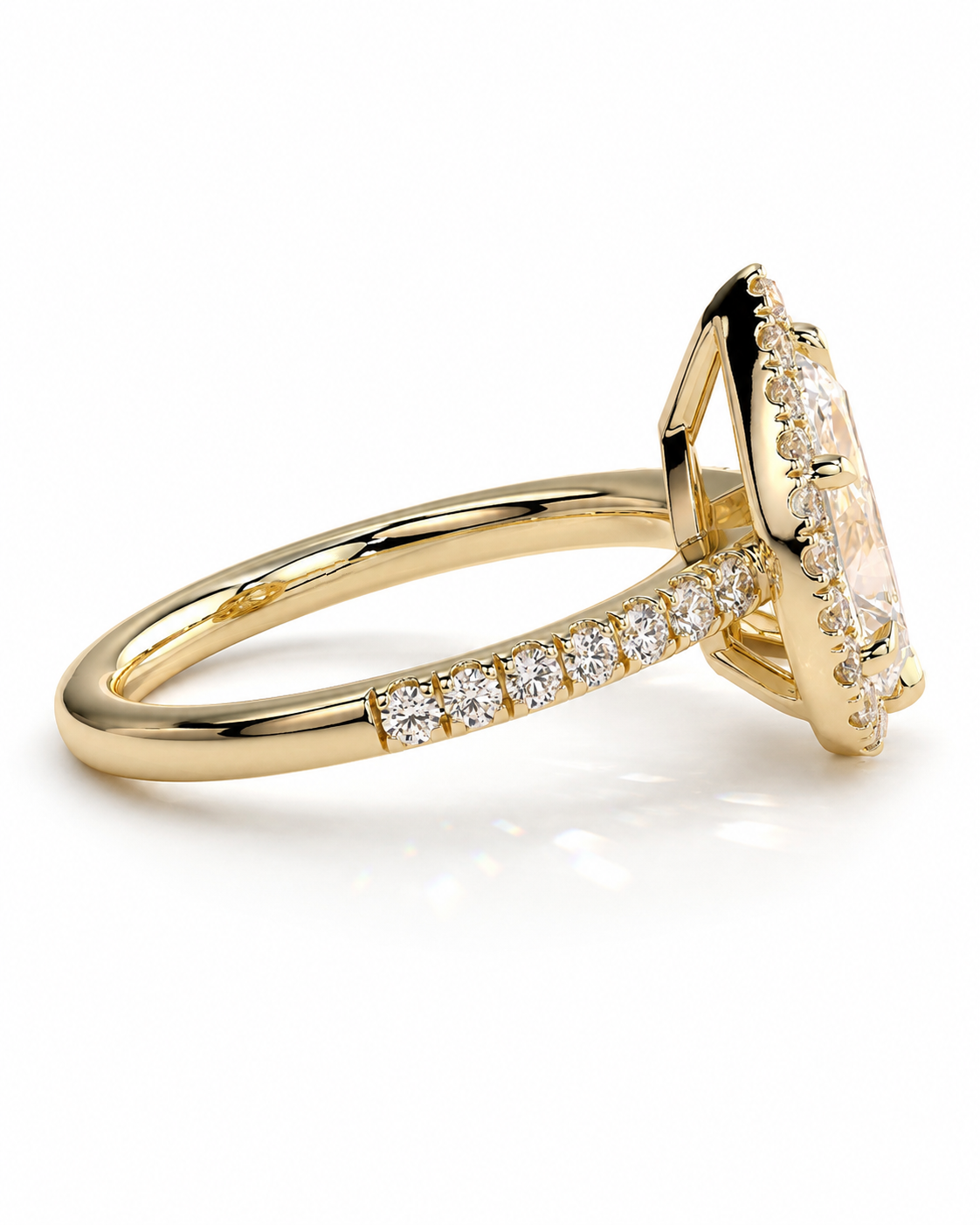color_10K_YG, color_14K_YG &&A yellow gold ring featuring a large marquise-cut center stone and a pavé band with small round diamonds, shown on a clean white background.