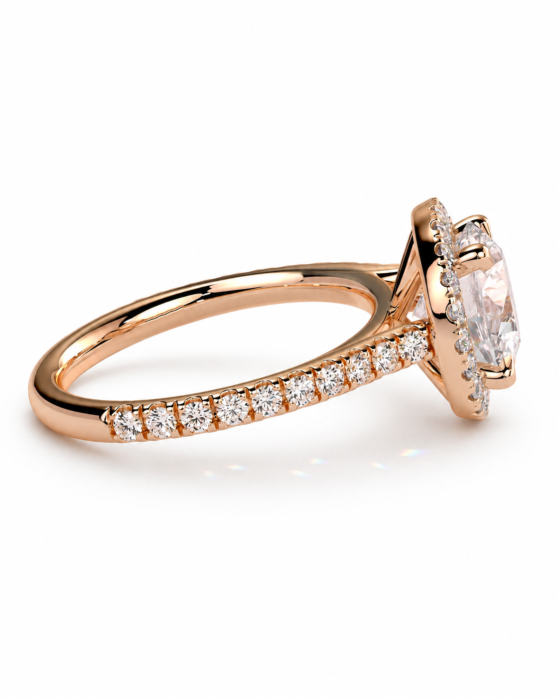color_10K_RG, color_14K_RG &&Rose gold engagement ring with a large oval-cut center stone and pavé-set round stones along the shank, shown on a white background.