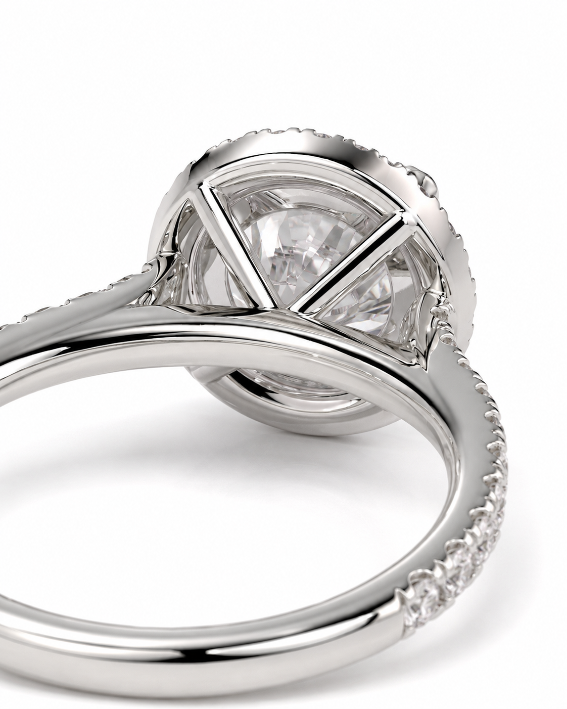 color_925_SIL,color_935_ARG,color_10K_WG, color_14K_WG &&Close-up of a silver-toned ring with a large clear gemstone in a high-profile bezel setting, showing the polished band and small accent stones on a white background.