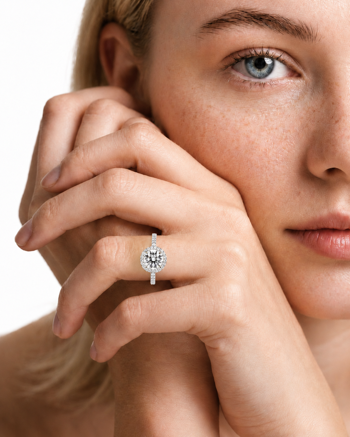 color_925_SIL,color_935_ARG,color_10K_WG, color_14K_WG &&A close-up lifestyle shot of a model wearing a silver-toned ring with a central starburst cluster of small clear gemstones, set against a clean white background.