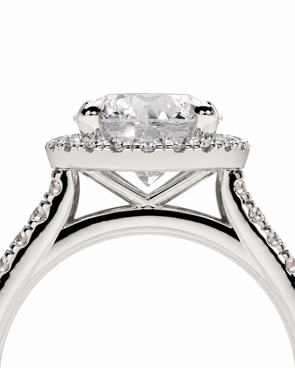 color_925_SIL,color_935_ARG,color_10K_WG, color_14K_WG &&A close-up studio shot of a silver-toned diamond ring featuring a large oval-cut center stone in a halo setting with small accent diamonds on a white background.