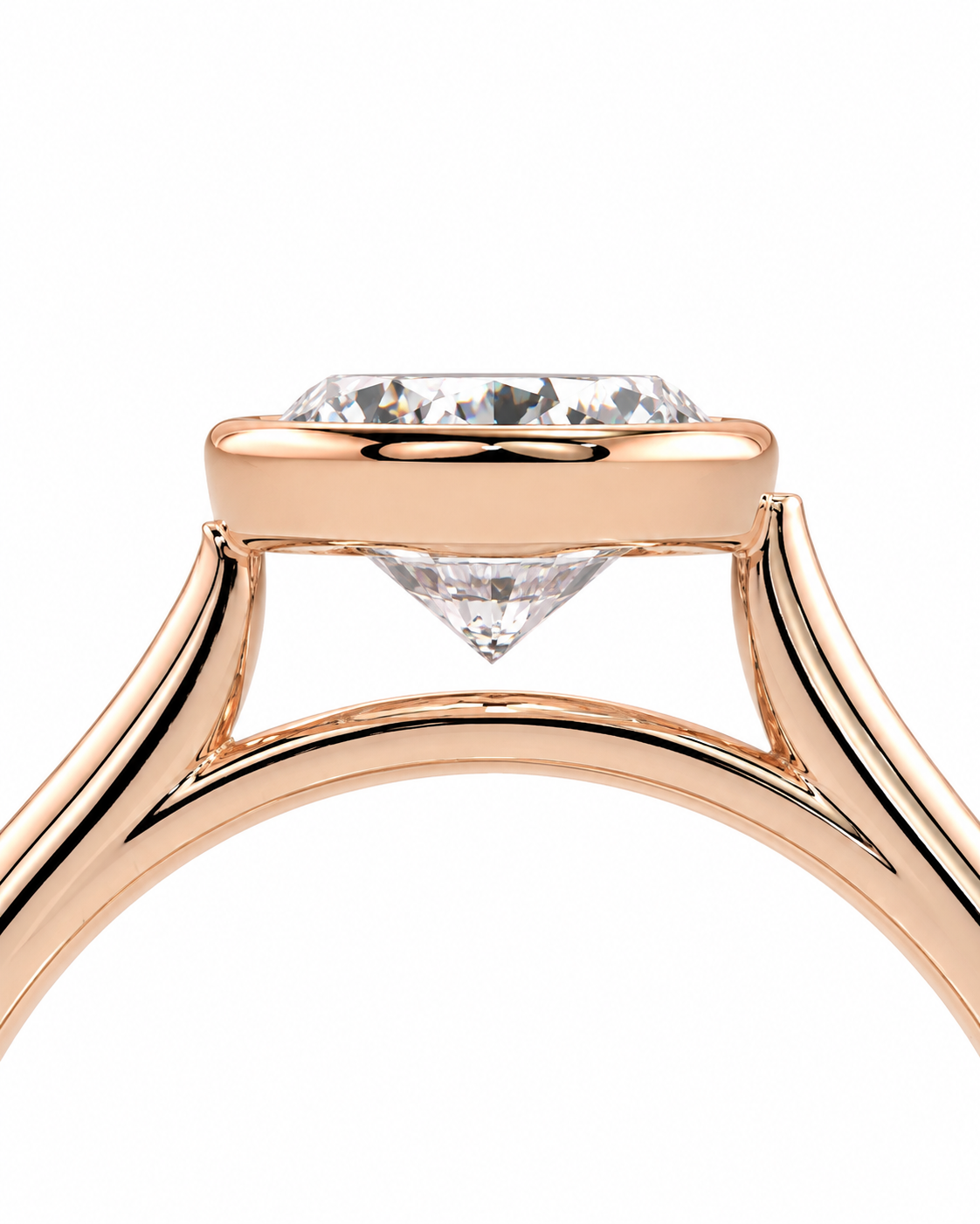 color_10K_RG, color_14K_RG &&Close-up of a rose gold solitaire engagement ring with a clear round-cut diamond, set against a solid white background.