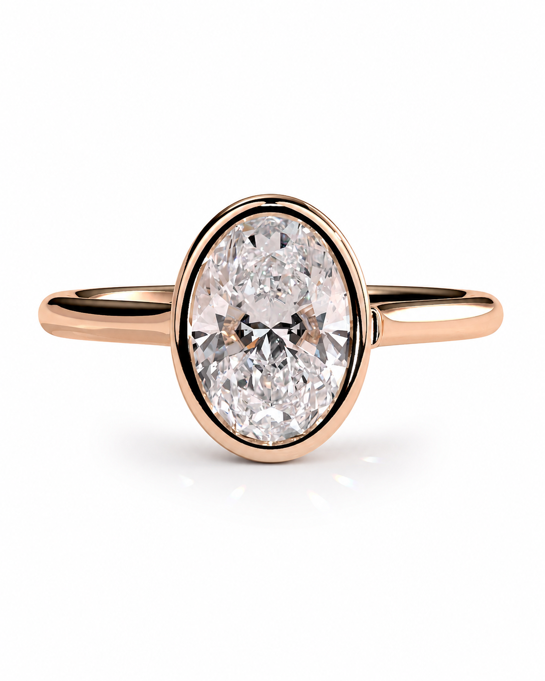 color_10K_RG, color_14K_RG &&An oval-cut diamond ring in a rose gold setting with a polished band, shown on a clean white background.