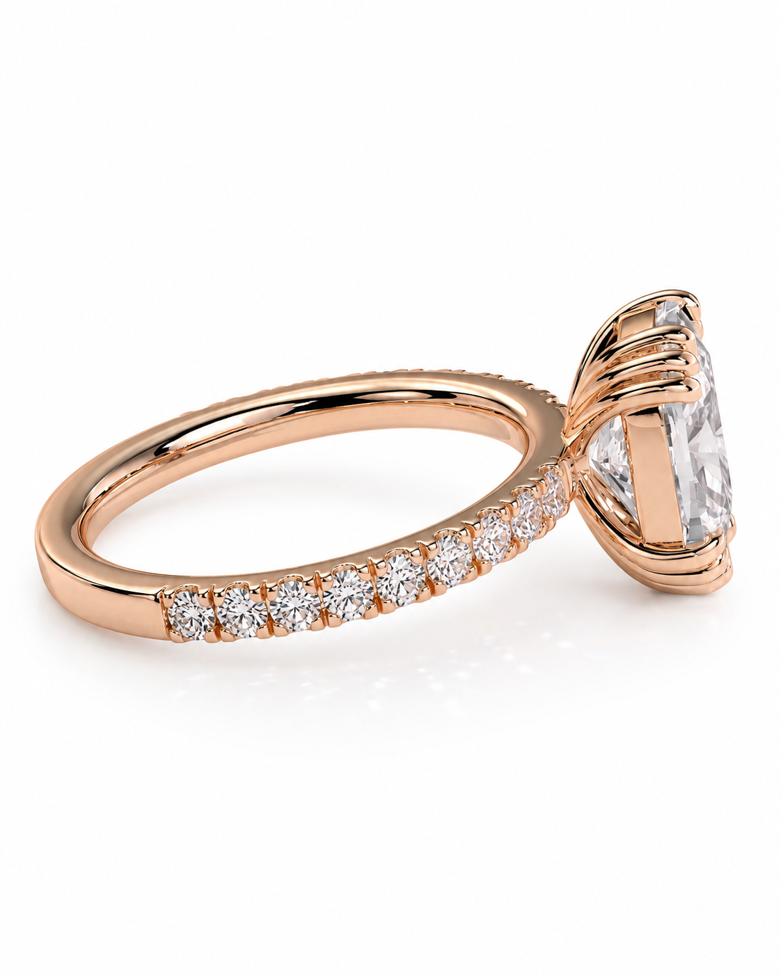 color_10K_RG, color_14K_RG &&Rose gold ring with a large oval-cut clear center stone and a pavé band of small round stones, shown on a clean white background.