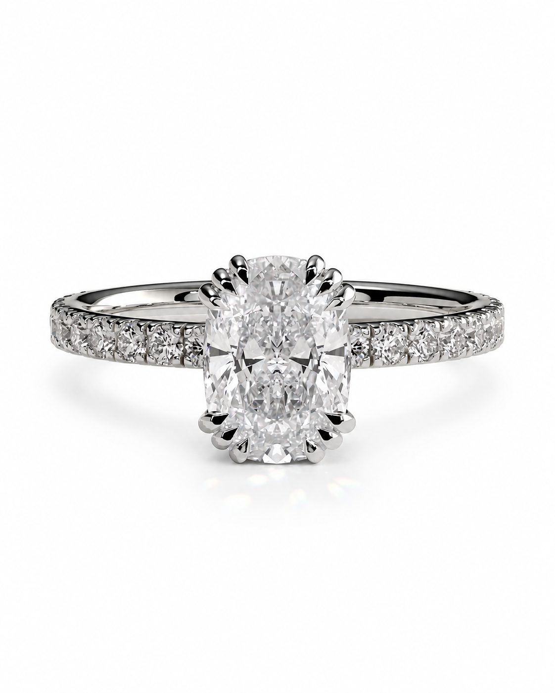 color_925_SIL,color_935_ARG,color_10K_WG, color_14K_WG &&An oval-cut diamond engagement ring with a radiant-cut center stone in a prong setting, featuring a pavé band set with smaller diamonds on a clean white background.
