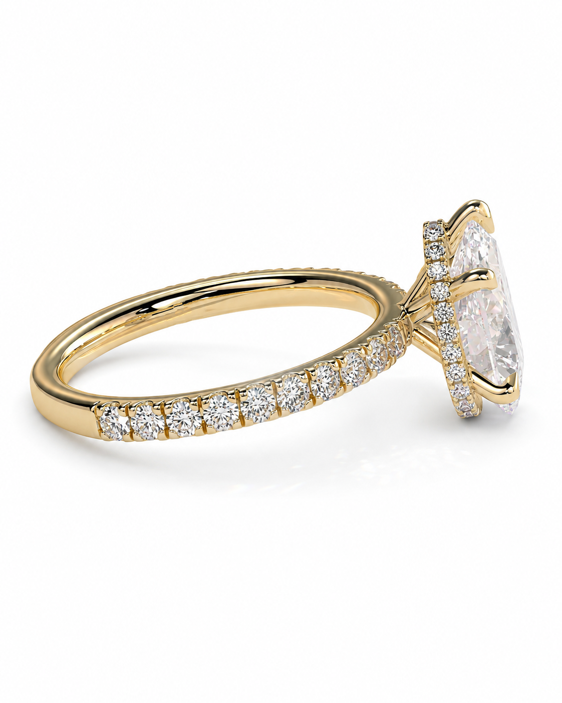 color_10K_YG, color_14K_YG &&A yellow gold ring featuring a large oval-cut clear center stone in a prong setting, with a pavé band of small round diamonds, shown on a white background.