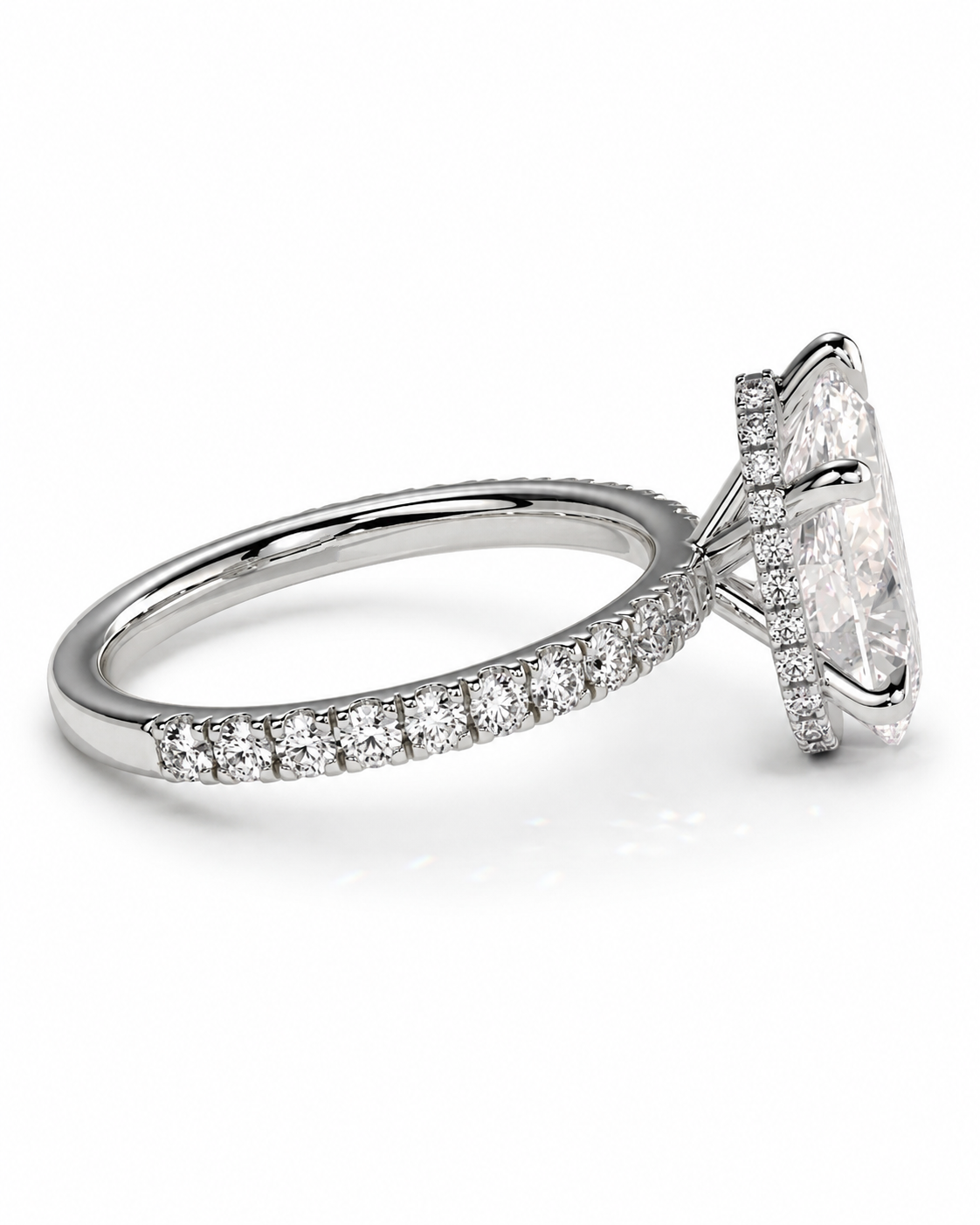 color_925_SIL,color_935_ARG,color_10K_WG, color_14K_WG &&A silver-toned diamond engagement ring with a large oval center stone and a pavé-set diamond band, shown on a clean white background.