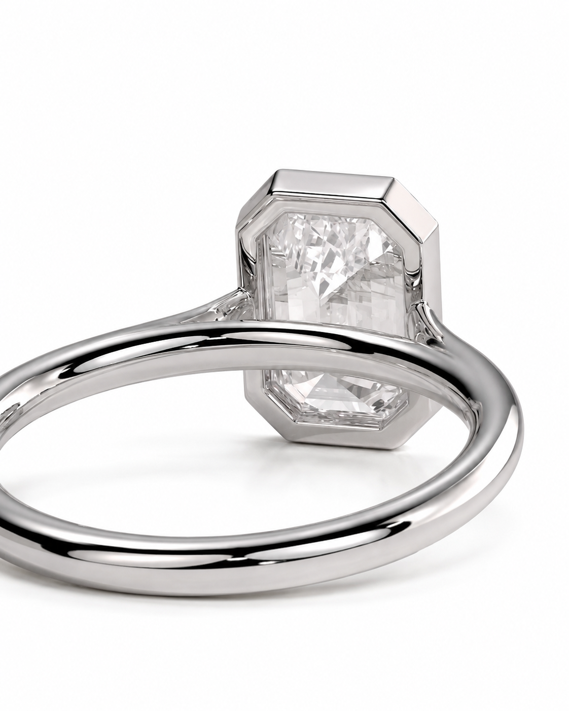 color_925_SIL,color_935_ARG,color_10K_WG, color_14K_WG &&A silver-toned ring featuring a large, faceted clear gemstone in a bezel setting, shown on a clean white background.