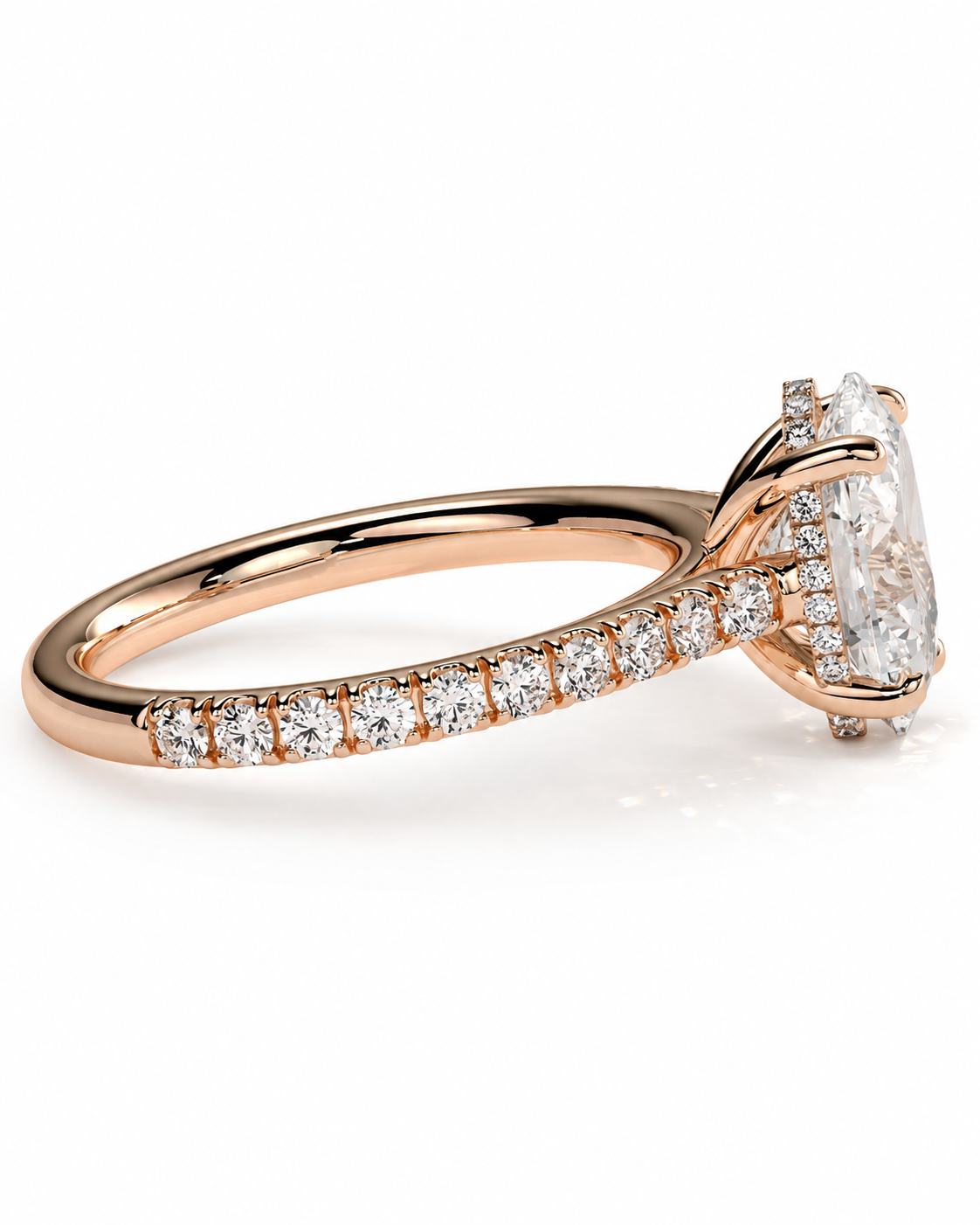 color_10K_RG, color_14K_RG &&Rose gold engagement ring with a large oval-cut center stone and pavé-set diamonds along the shank, shown on a white background.