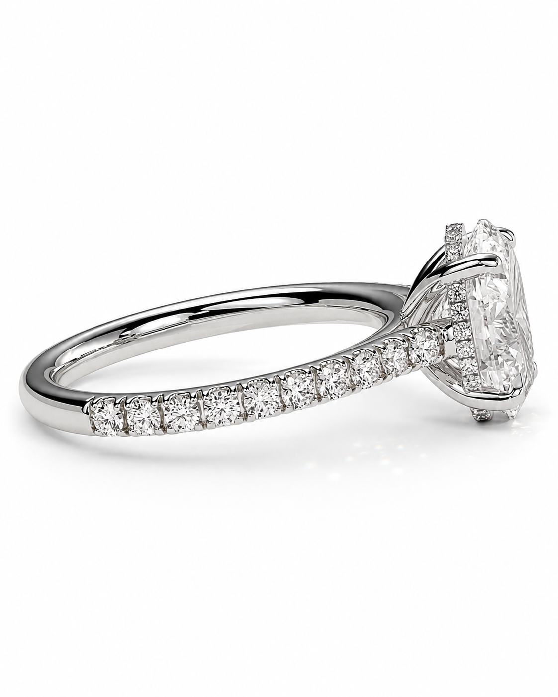 color_925_SIL,color_935_ARG,color_10K_WG, color_14K_WG &&A diamond engagement ring with a radiant-cut center stone and a pavé-set band in a silver-toned metal, shown on a clean white background.