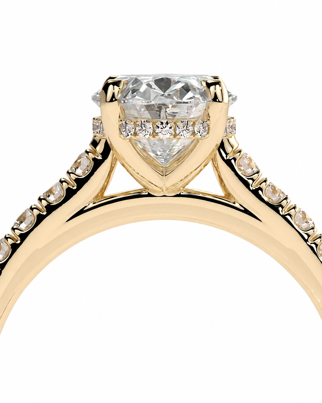 color_10K_YG, color_14K_YG &&A close-up of a yellow gold ring featuring a heart-shaped clear gemstone in a prong setting, with small accent stones along the shoulders, shown against a plain white background.