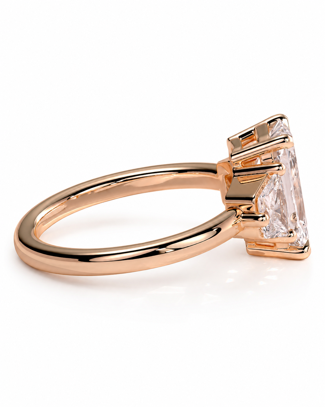 color_10K_RG, color_14K_RG &&A rose gold ring with a large rectangular clear gemstone in a prong setting, shown on a clean white background.