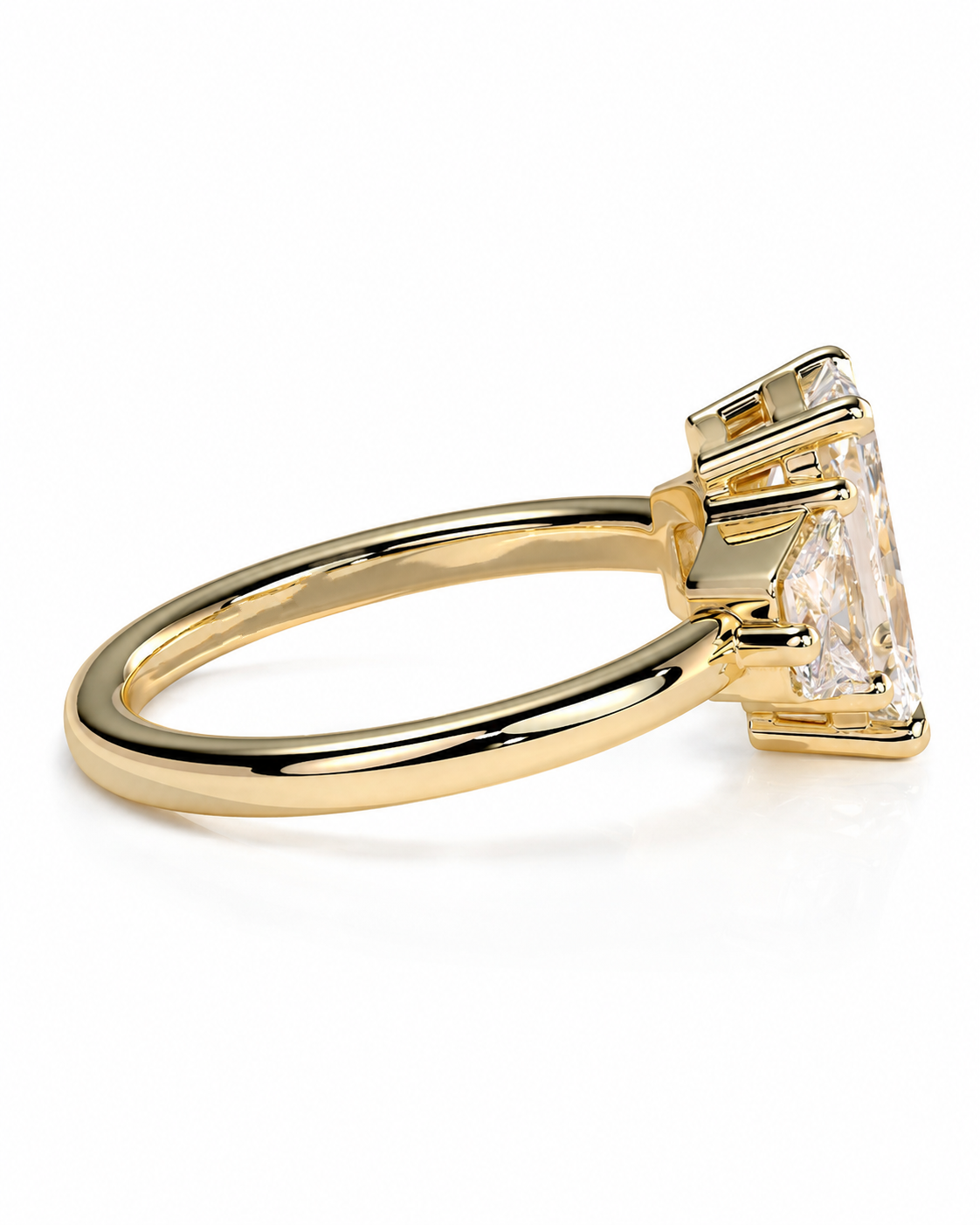 color_10K_YG, color_14K_YG &&A yellow gold ring featuring a large, clear rectangular gemstone in a prong setting, shown from a side angle against a plain white background.