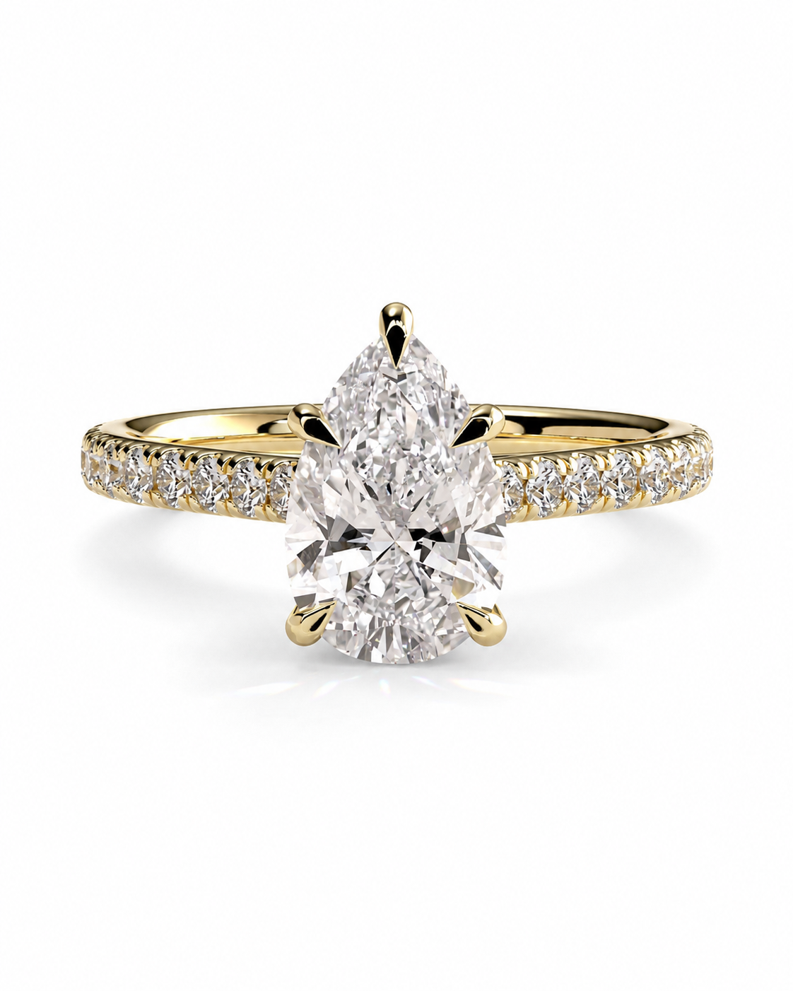 color_10K_YG, color_14K_YG &&A yellow gold pear-cut diamond engagement ring with a pavé band, shown on a clean white background.