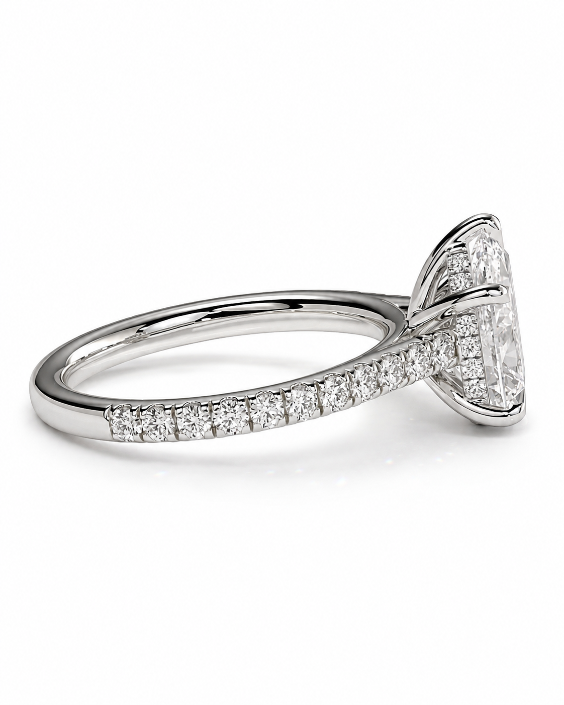 color_925_SIL,color_935_ARG,color_10K_WG, color_14K_WG &&A silver-toned engagement ring featuring a large rectangular emerald-cut clear center stone with smaller accent stones along the side, set against a clean white background.