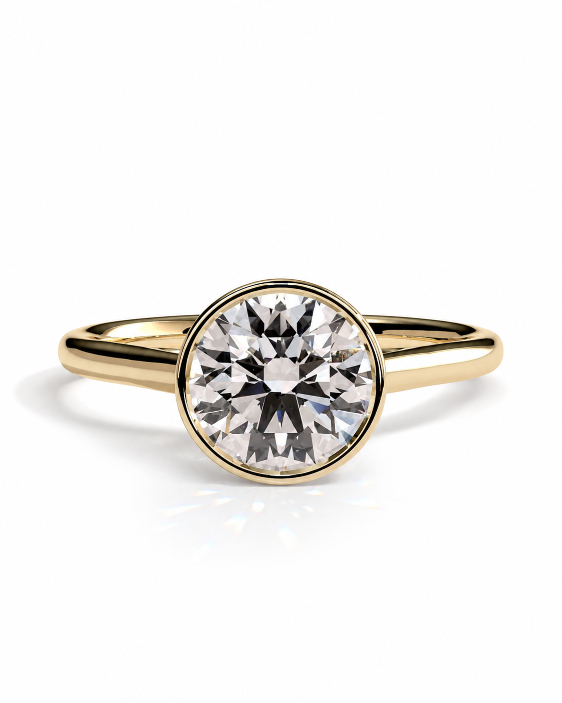 color_10K_YG, color_14K_YG &&A yellow gold solitaire engagement ring featuring a round brilliant-cut clear gemstone in a bezel setting, shown on a clean white background.