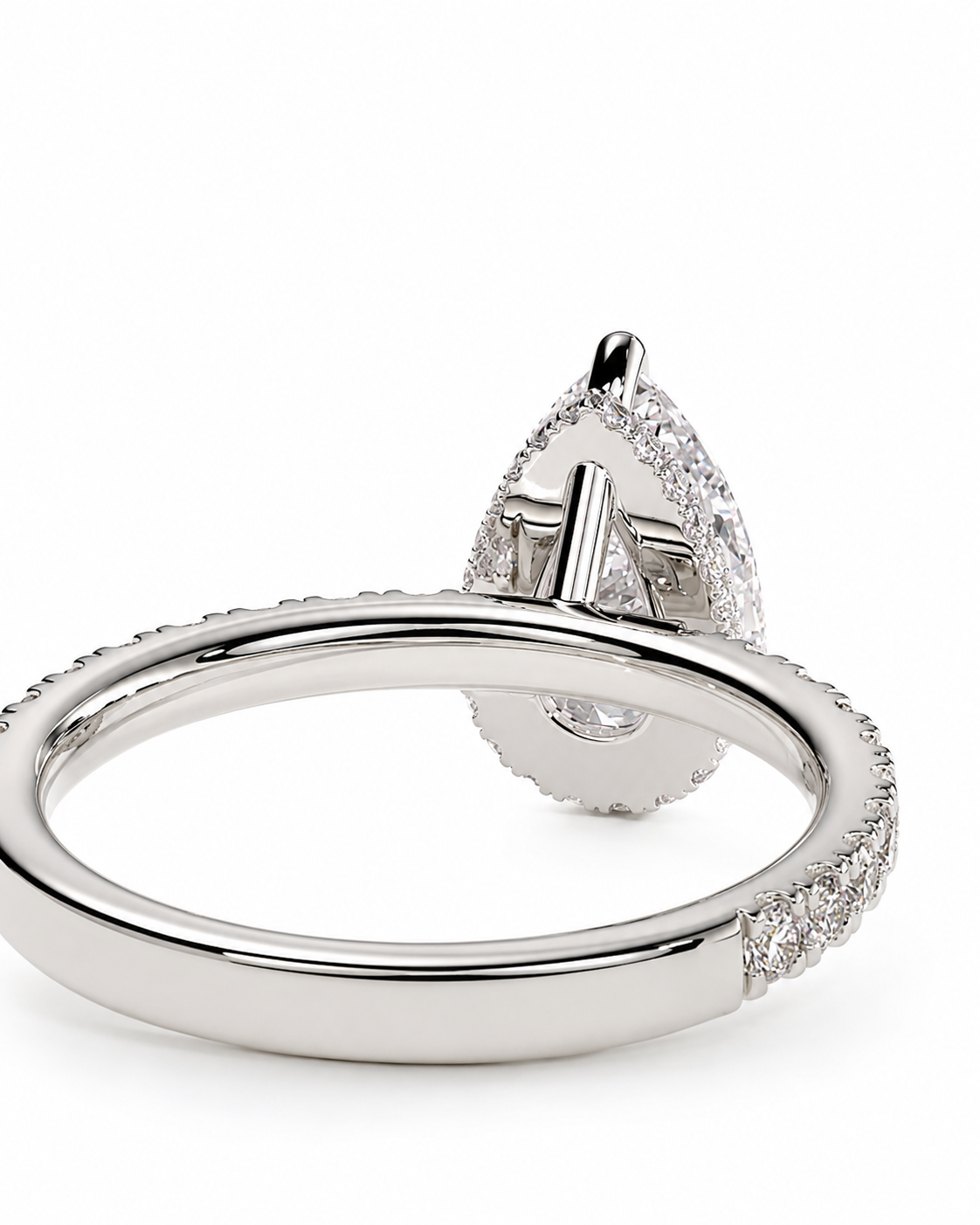 color_925_SIL,color_935_ARG,color_10K_WG, color_14K_WG &&A silver-toned teardrop-shaped ring with a pavé-set clear gemstone and a smooth pavé band, shown on a clean white background.