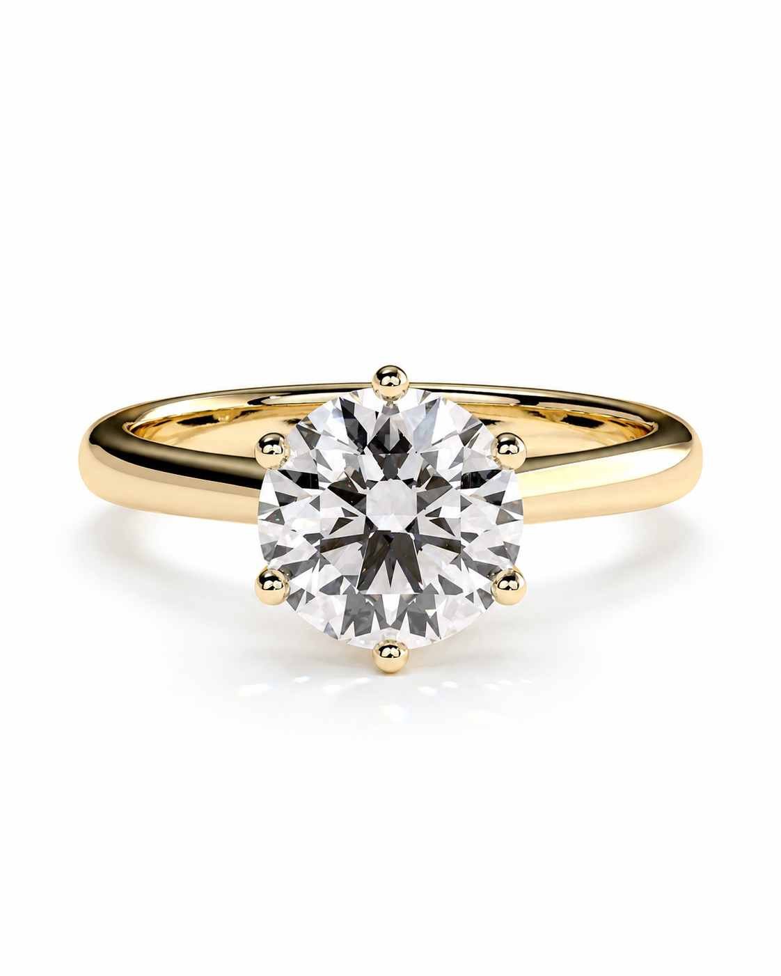 color_10K_YG, color_14K_YG &&A classic solitaire engagement ring featuring a round brilliant-cut diamond set in a yellow gold four-prong band, shown on a clean white background.