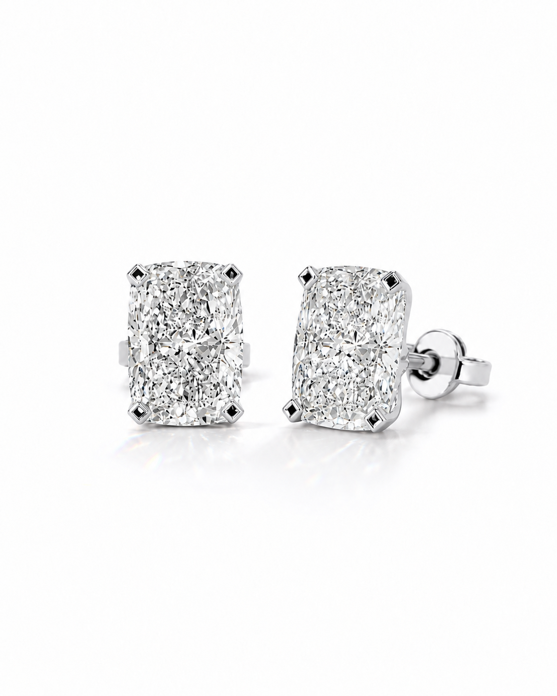 color_925_SIL,color_935_ARG,color_10K_WG, color_14K_WG &&A pair of rectangular cushion-cut diamond stud earrings set in silver-tone metal with post backs, displayed on a clean white background.