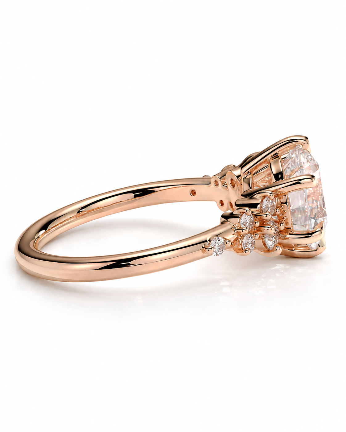 color_10K_RG, color_14K_RG &&Rose gold ring with a large oval clear gemstone and smaller accent diamonds on the band, shown on a clean white background.